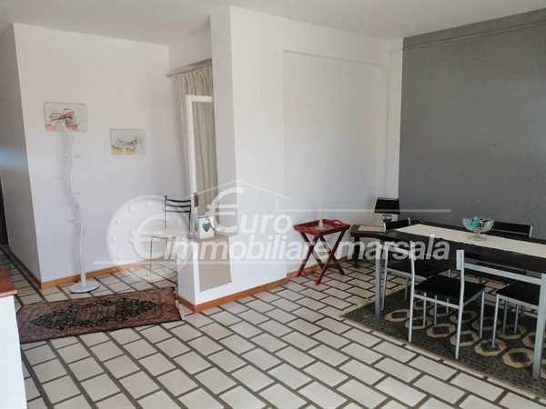 Vende attico con veranda